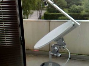 Motorized satellite dish with