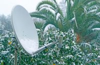 Keeping snow off satellite dish